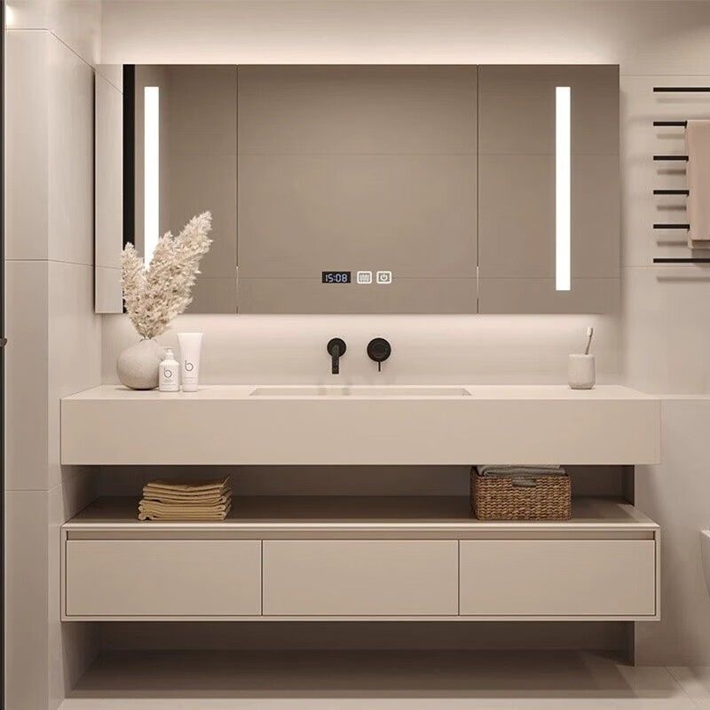 Armario de espejos LED rectangulares con encimera de piedra sinterizada y espacio de almacenamiento en el baño